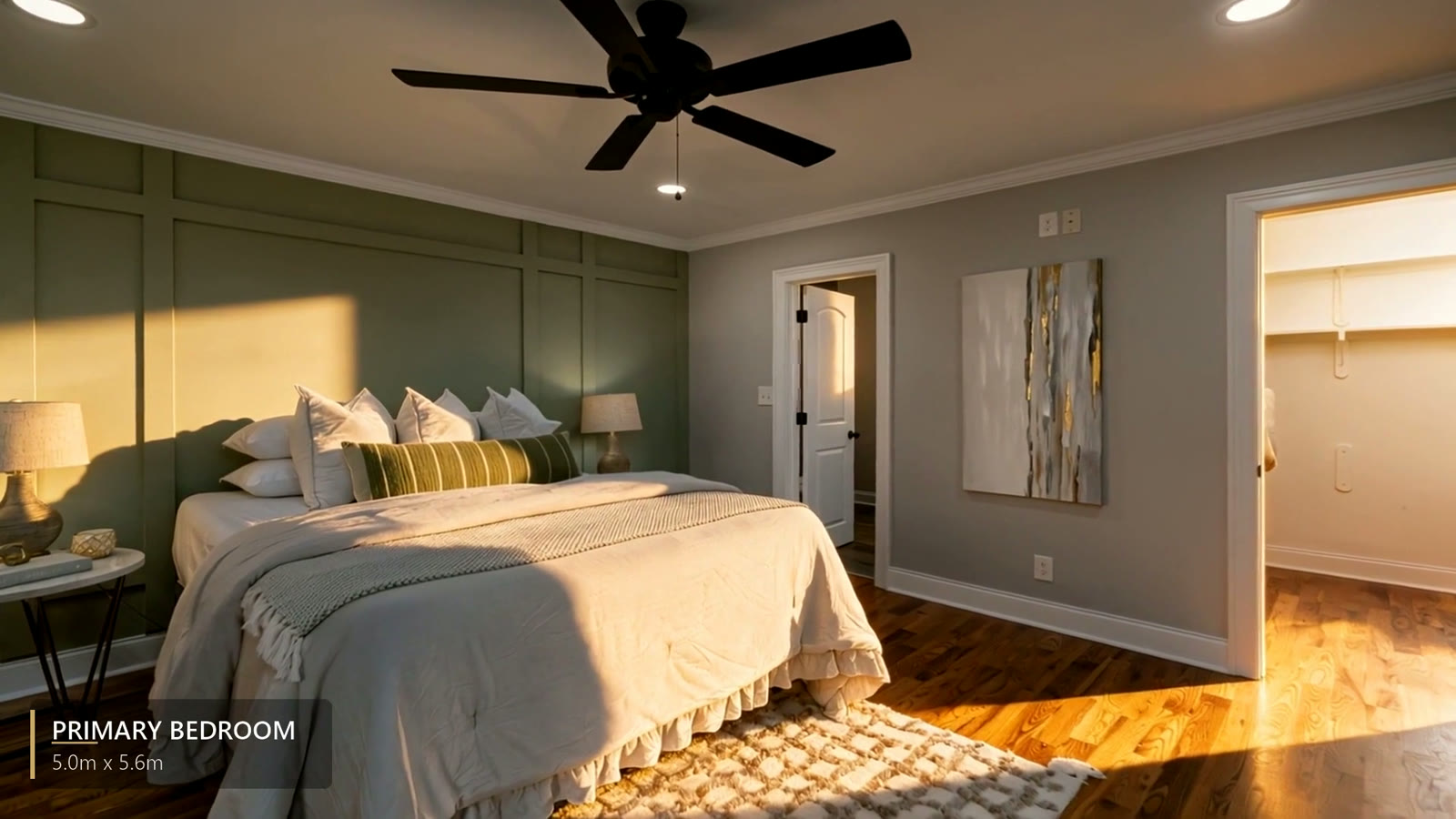 A film frame of the primary bedroom with the floor-plan mini-map in one corner and 'Primary Bedroom 5.0m × 5.6m' on screen